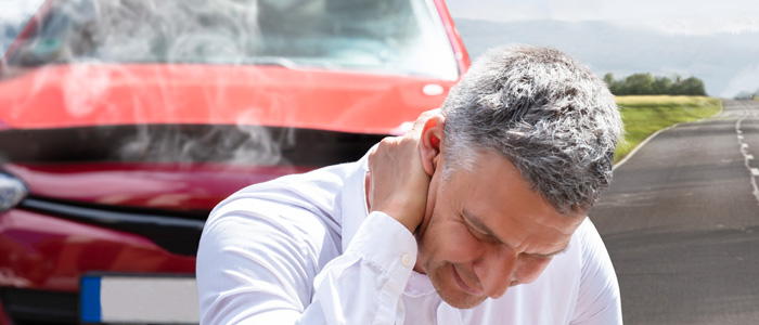 a man with neck pain from an auto injury