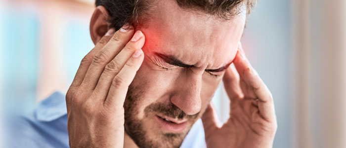 man with migraine
